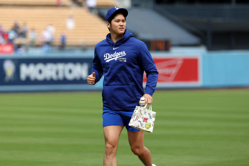 Mar 24, 2024; Los Angeles, California, USA; Los Angeles Dodgers designated hitter Shohei Ohtani (17) on the field prior to the spring training game against the Los Angeles Angels at Dodger Stadium. Mandatory Credit: Kiyoshi Mio-USA TODAY Sports/File Photo